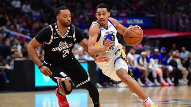 Golden State Warriors guard Jordan Poole and Los Angeles Clippers guard Norman Powell