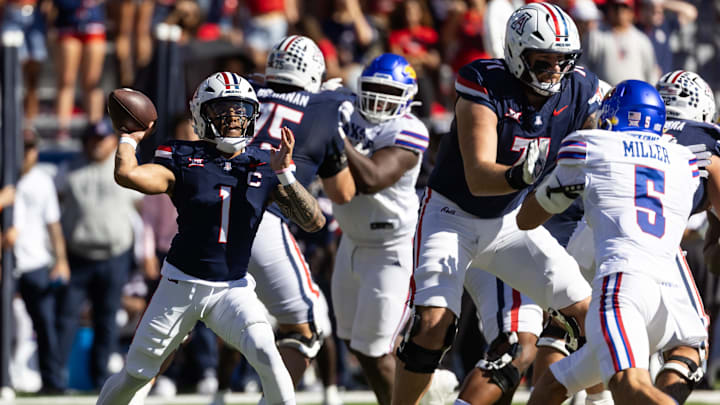 Nov 8, 2025; Tucson, Arizona, USA; Arizona Wildcats quarterback Noah Fifita (1) against the Kansas Jayhawks in the first half at Arizona Stadium. Mandatory Credit: Mark J. Rebilas-Imagn Images