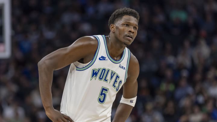 Jan 3, 2024; Minneapolis, Minnesota, USA; Minnesota Timberwolves guard Anthony Edwards (5) looks on against the New Orleans Pelicans in the first half at Target Center. 