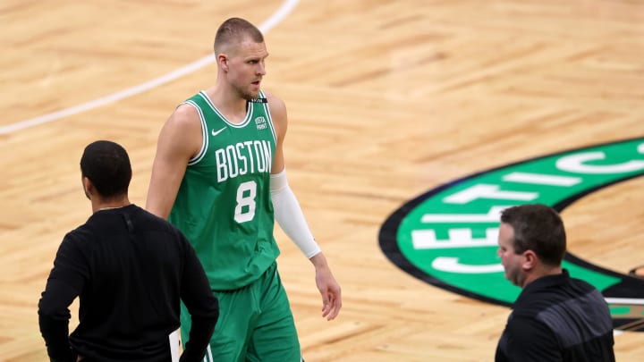Jun 17, 2024; Boston, Massachusetts, USA; Boston Celtics center Kristaps Porzingis (8) walks off the court against the Dallas Mavericks 