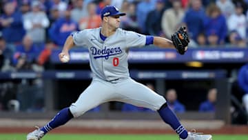 Oct 18, 2024; New York City, New York, USA; Los Angeles Dodgers starting pitcher Jack Flaherty (0) pitches against the New York Mets during the second inning of game five of the NLCS during the 2024 MLB playoffs at Citi Field.