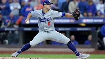 Oct 18, 2024; New York City, New York, USA; Los Angeles Dodgers starting pitcher Jack Flaherty (0) pitches against the New York Mets during the second inning of game five of the NLCS during the 2024 MLB playoffs at Citi Field. Mandatory Credit: Brad Penner-Imagn Images