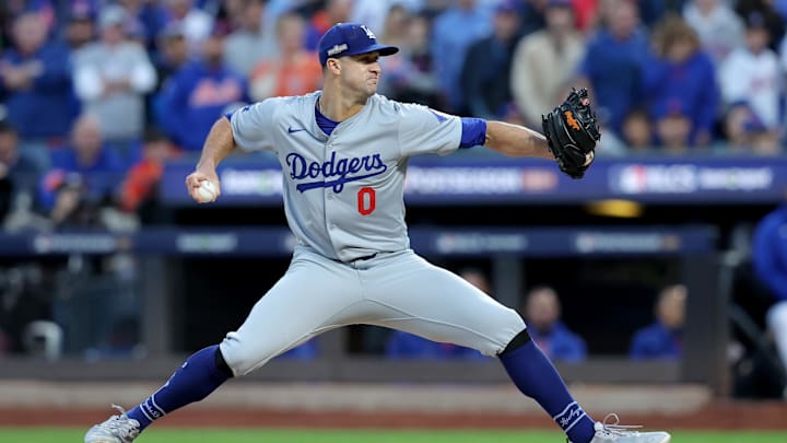 Oct 18, 2024; New York City, New York, USA; Los Angeles Dodgers starting pitcher Jack Flaherty (0) pitches against the New York Mets during the second inning of game five of the NLCS during the 2024 MLB playoffs at Citi Field.
