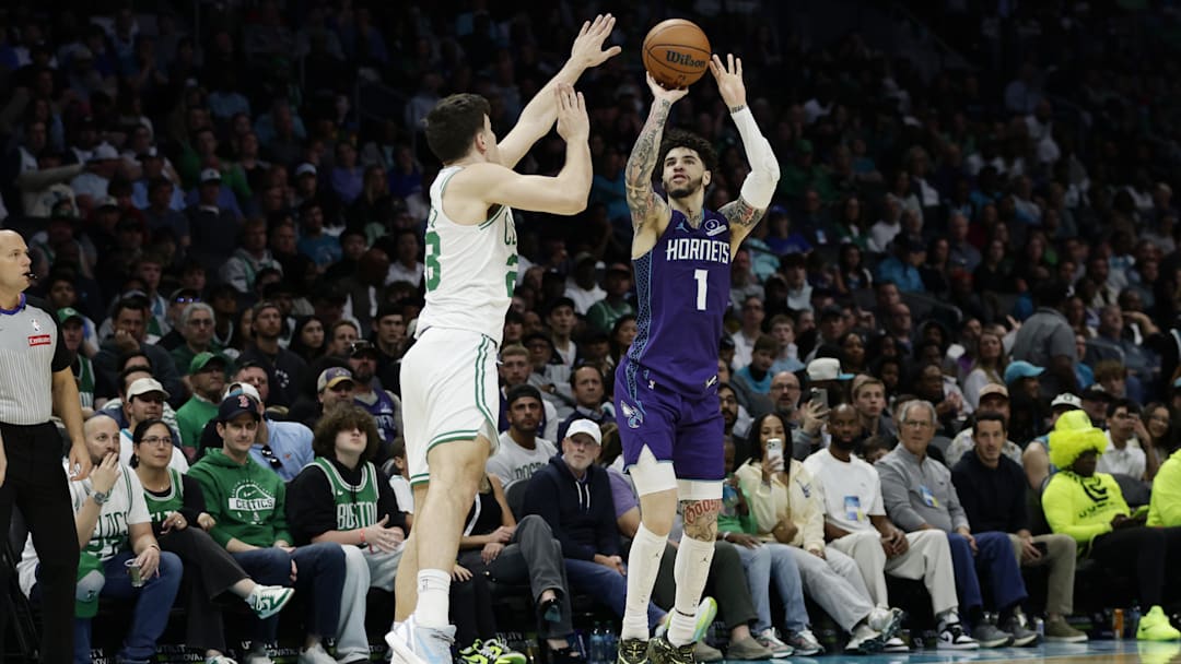 Mar 29, 2026; Charlotte, North Carolina, USA; Charlotte Hornets guard LaMelo Ball (1) shoots over Boston Celtics guard Hugo González (28) during the second half at Spectrum Center. Mandatory Credit: Brian Westerholt-Imagn Images