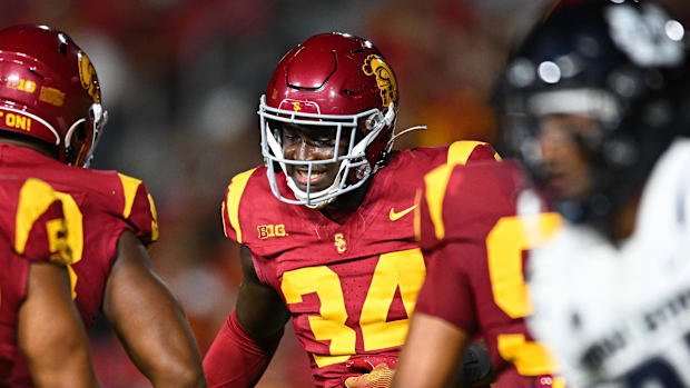 USC defensive end Braylan Shelby (34) head to Southern California after starring at Friendswood high in Texas.