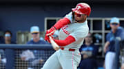 Feb 25, 2025; Port Charlotte, Florida, USA;  Philadelphia Phillies outfielder Justin Crawford (80) breaks his bat as he reaches on a fielders choice against the Tampa Bay Rays during the fourth inning at Charlotte Sports Park. 