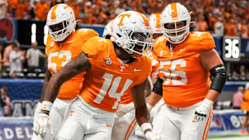 Tennessee wide receiver Braylon Staley (14) celebrates a touchdown during the Aflac Kickoff Game between the Volunteers and Syracuse held at Mercedes-Benz Stadium in Atlanta, Ga., on August 30, 2025.