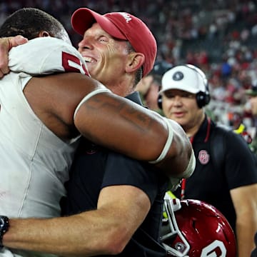 Nov 15, 2025; Tuscaloosa, Alabama, USA;  Oklahoma Sooners head coach Brent Venables celebrates with defensive lineman Gracen Halton (56) after Oklahoma defeated the Alabama Crimson Tide 23-21 at Saban Field at Bryant-Denny Stadium. 