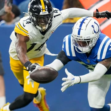 Indianapolis Colts safety Julian Blackmon (32) recovers a ball fumbled by Pittsburgh Steelers wide receiver George Pickens (14) on Sunday, Sept. 29, 2024, during a game against the Pittsburgh Steelers at Lucas Oil Stadium in Indianapolis.