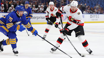 Nov 5, 2024; Buffalo, New York, USA;  Buffalo Sabres defenseman Connor Clifton (75) tries to block a shot by Ottawa Senators left wing Noah Gregor (73) during the first period at KeyBank Center. Mandatory Credit: Timothy T. Ludwig-Imagn Images
