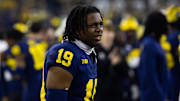 Jan 8, 2024; Houston, TX, USA; Michigan Wolverines linebacker Jason Hewlett (19) against the Washington Huskies during the 2024 College Football Playoff national championship game at NRG Stadium. Mandatory Credit: Mark J. Rebilas-Imagn Images