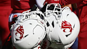 Oct 1, 2022; Pullman, Washington, USA; Washington State Cougars helmets against the California Golden Bears in the first half at Gesa Field at Martin Stadium. Mandatory Credit: James Snook-Imagn Images