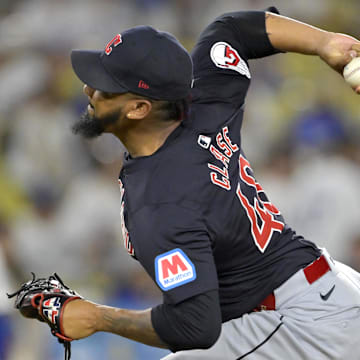 Sep 6, 2024; Los Angeles, California, USA;  Cleveland Guardians relief pitcher Emmanuel Clase (48) earns a save in the ninth inning against the Los Angeles Dodgers at Dodger Stadium.