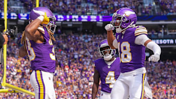 Aaron Jones celebrates his touchdown with Justin Jefferson in the Minnesota Vikings' win over the Houston Texans./ Brad Rempel/Imagn Images
