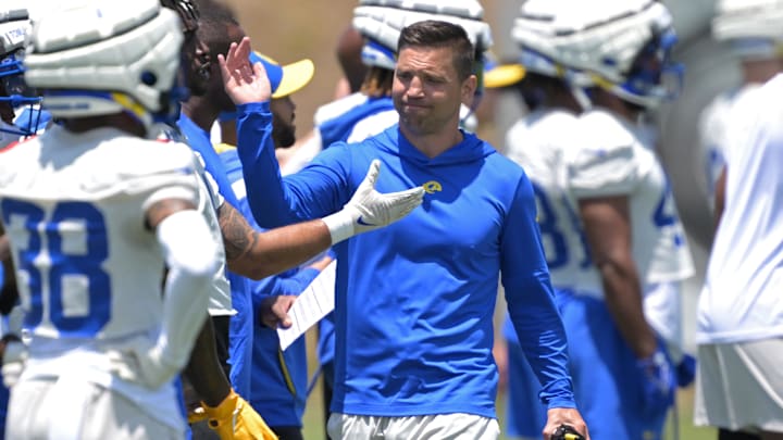 May 28, 2024; Thousand Oaks, CA, USA; Los Angeles Rams defensive coordinator Chris Shula talks with players during OTAs at the team training facility at California Lutheran University. Mandatory Credit: Jayne Kamin-Oncea-Imagn Images
