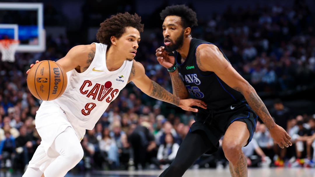 Dec 27, 2023; Dallas, Texas, USA;  Cleveland Cavaliers guard Craig Porter (9) drives to the basket as Dallas Mavericks forward Derrick Jones Jr. (55) defends during the first quarter at American Airlines Center. Mandatory Credit: Kevin Jairaj-USA TODAY Sports