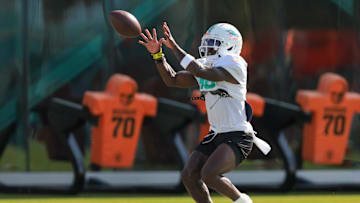 Miami Dolphins wide receiver Tyreek Hill (10) catches the football during training camp at Baptist Health Training Complex.