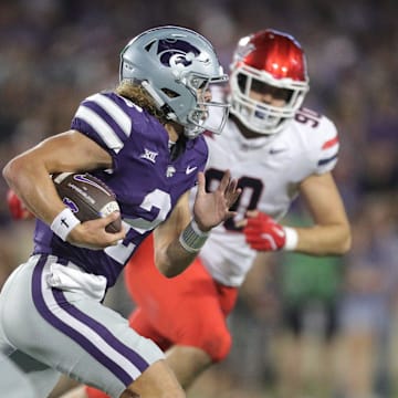 Kansas State Wildcats quarterback Avery Johnson (2) runs the ball during the third quarter of the game against Arizona at Bill Snyder Family Stadium on Friday, September 13, 2024.