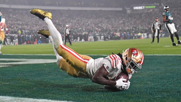 Dec 3, 2023; Philadelphia, Pennsylvania, USA; San Francisco 49ers wide receiver Brandon Aiyuk (11) catches touchdown pass against Philadelphia Eagles safety Reed Blankenship (32) during the second quarter at Lincoln Financial Field. Mandatory Credit: Eric Hartline-USA TODAY Sports