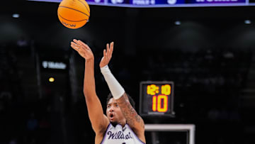 Nov 20, 2025; Kansas City, Missouri, USA; Kansas State Wildcats guard PJ Haggerty (4) shoots against the Mississippi State Bulldogs during the first half of the game at T-Mobile Center. Mandatory Credit: Denny Medley-Imagn Images
