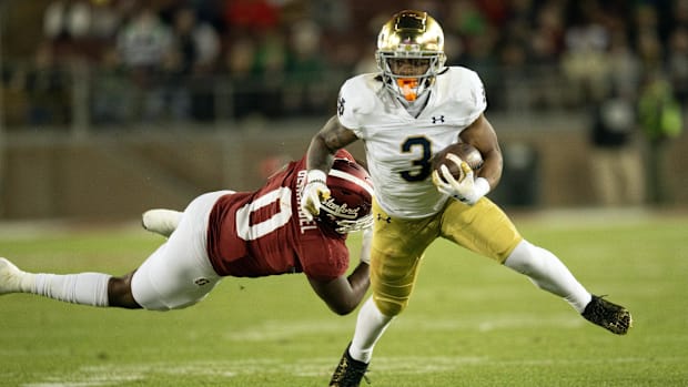Gi'Bran Payne of Notre Dame rushes against Stanford in 202
