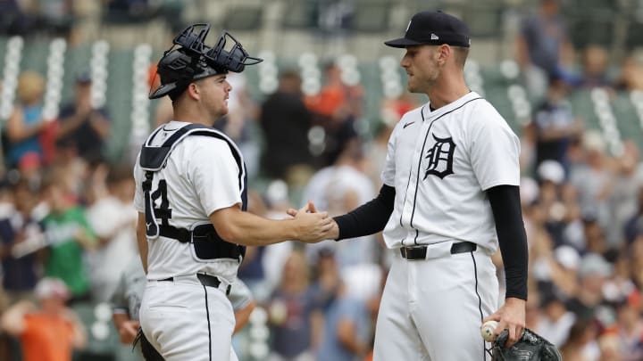 Jun 23, 2024; Detroit, Michigan, USA;  Detroit Tigers catcher Jake Rogers (34) and relief pitcher Joey Wentz (43) celebrate after defeating the Chicago White Sox at Comerica Park. 