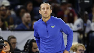 Jul 9, 2025; Chicago, Illinois, USA; Dallas Wings head coach Chris Koclanes reacts during the first half at Wintrust Arena. Mandatory Credit: Kamil Krzaczynski-Imagn Images