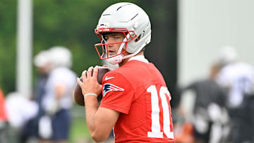 Jun 9, 2025; Foxborough, MA, USA; New England Patriots quarterback Drake Maye (10) looks to pass the ball during minicamp at Gillette Stadium. Mandatory Credit: Eric Canha-Imagn Images
