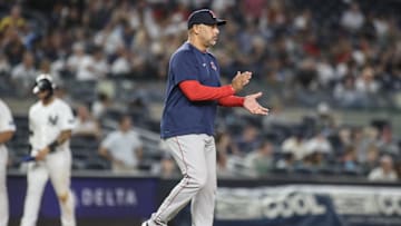 Aug 18, 2023; Bronx, New York, USA; Boston Red Sox manager Alex Cora (13) comes out to make a