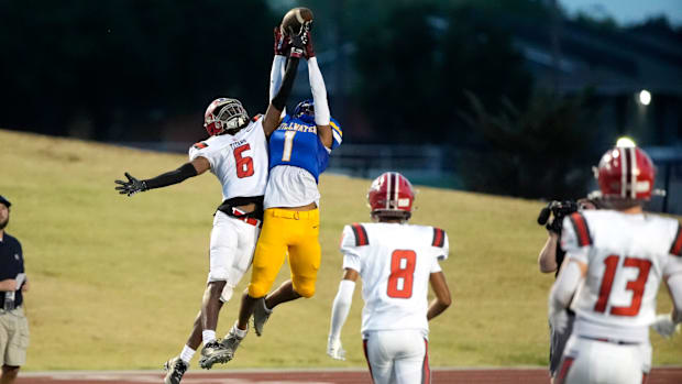 Carl Albert's Trystan Haynes breaks up a pass intended for Stillwater's Deakon Jones.