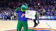 Jan 7, 2025; Gainesville, Florida, USA; Florida Gators mascot Albert the Alligator holds a sign after a game against the Tennessee Volunteers at Exactech Arena at the Stephen C. O'Connell Center. Mandatory Credit: Matt Pendleton-Imagn Images