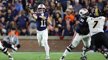 Oct 18, 2025; Auburn, Alabama, USA; Auburn Tigers quarterback Jackson Arnold (11) throws a pass during the first quarter against the Missouri Tigers at Jordan-Hare Stadium. Mandatory Credit: John Reed-Imagn Images