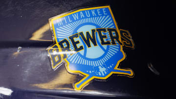 Jun 18, 2023; Milwaukee, Wisconsin, USA;  A Milwaukee Brewers logo on a batting helmet in the dugout