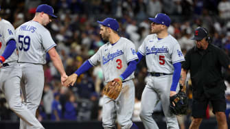 May 6, 2023; San Diego, California, USA;  Los Angeles Dodgers relief pitcher Evan Phillips (59) and