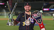 Seattle Mariners catcher Cal Raleigh holds the trophy after winning the 2025 Home Run Derby ahead of the MLB All-Star Game