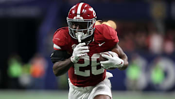 Dec 2, 2023; Atlanta, GA, USA; Alabama Crimson Tide running back Jam Miller (26) runs to score a touchdown in the second quarter against the Georgia Bulldogs at Mercedes-Benz Stadium. Mandatory Credit: Brett Davis-Imagn Images