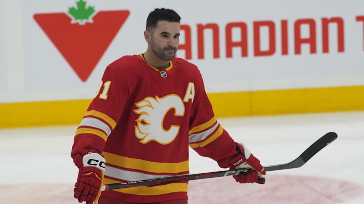 Mar 17, 2025; Toronto, Ontario, CAN; Calgary Flames forward Nazem Kadri (91) skates during warm-up before a game against the Toronto Maple Leafs at Scotiabank Arena. Mandatory Credit: John E. Sokolowski-Imagn Images