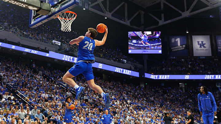 Oct 13, 2023; Lexington, KY, USA; Kentucky Wildcats guard Joey Hart (20) competes in the dunk contest during Big Blue Madness at Rupp Arena at Central Bank Center. Mandatory Credit: Jordan Prather-Imagn Images