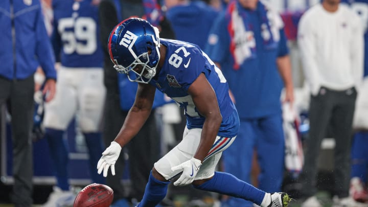 Aug 8, 2024; East Rutherford, New Jersey, USA; New York Giants wide receiver Isaiah McKenzie (87) fumbles a punt during the first half against the Detroit Lions at MetLife Stadium.  