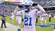 Dec 22, 2024; Chicago, Illinois, USA; Detroit Lions cornerback Amik Robertson (21) walks off the field after a game against the Chicago Bears at Soldier Field. Mandatory Credit: Daniel Bartel-Imagn Images