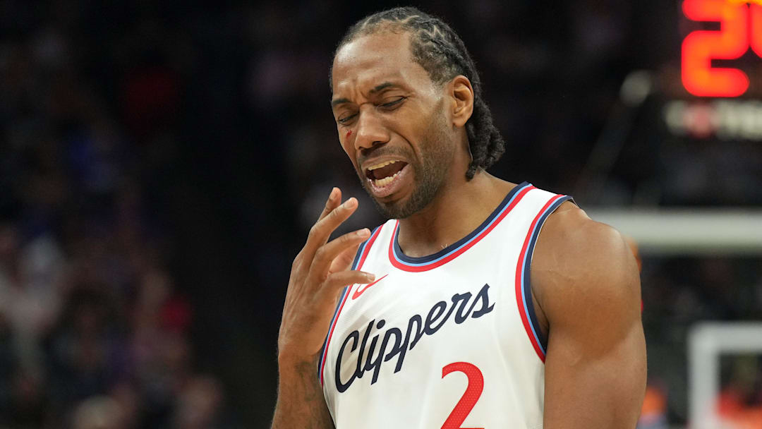 Apr 11, 2025; Sacramento, California, USA; Los Angeles Clippers forward Kawhi Leonard (2) reacts after incurring a facial cut during the fourth quarter against the Sacramento Kings at Golden 1 Center. Mandatory Credit: Darren Yamashita-Imagn Images