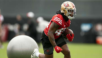 Jul 24, 2025; Santa Clara, CA, USA; San Francisco 49ers running back Corey Kiner (49) runs an obstacle course during the second day of training camp.
