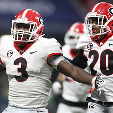 Dec 2, 2017; Atlanta, GA, USA; Georgia Bulldogs linebacker Roquan Smith (3) celebrates with teammates after recovering a fumble against the Auburn Tigers during the fourth quarter of the SEC Championship game at Mercedes-Benz Stadium. Mandatory Credit: Brett Davis-Imagn Images