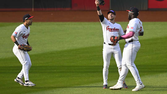 Oct 12, 2024; Cleveland, Ohio, USA; Cleveland Guardians outfielder Steven Kwan (38) outfielder Lane Thomas (8) and outfielder Jhonkensy Noel (43) celebrate after defeating the Detroit Tigers during game five of the ALDS for the 2024 MLB Playoffs at Progressive Field. Mandatory Credit: David Richard-Imagn Images