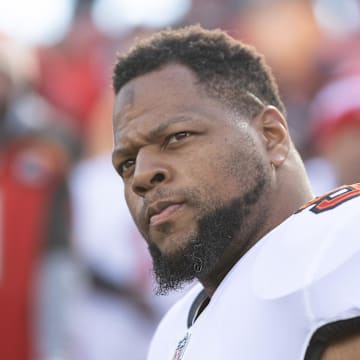 Tampa Bay Buccaneers defensive end Ndamukong Suh walks onto the field.