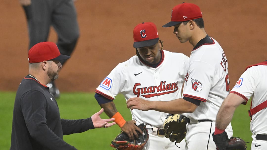 Sep 9, 2025; Cleveland, Ohio, USA; Cleveland Guardians third baseman Jose Ramirez (11) watches as manager Stephen Vogt (12) takes the ball from starting pitcher Joey Cantillo (54) during a pitching change in the ninth inning against the Kansas City Royals at Progressive Field. Mandatory Credit: David Richard-Imagn Images