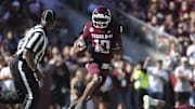 Nov 15, 2025; College Station, Texas, USA; Texas A&M Aggies quarterback Marcel Reed (10) runs with the ball during the third quarter against the South Carolina Gamecocks at Kyle Field. Mandatory Credit: Troy Taormina-Imagn Images
