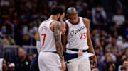 Oct 26, 2024; Denver, Colorado, USA; Los Angeles Clippers head coach Tyronn Lue talks with guard Amir Coffey (7) and forward Kai Jones (23) in the second quarter against the Denver Nuggets at Ball Arena. Mandatory Credit: Isaiah J. Downing-Imagn Images