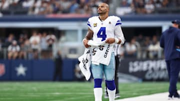 Sep 14, 2025; Arlington, Texas, USA; Dallas Cowboys quarterback Dak Prescott (4) reacts on the sideline during overtime against the New York Giants at AT&T Stadium. Mandatory Credit: Kevin Jairaj-Imagn Images