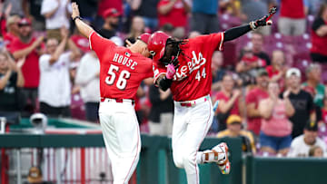 Cincinnati Reds shortstop Elly De La Cruz (44) and Cincinnati Reds third base coach J.R. House (56) dab after Cruz hits a two-run homer in the second inning of a MLB game between the Cincinnati Reds and Pittsburgh Pirates, Tuesday, Sept. 23, 2025, at Great American Ball Park in downtown Cincinnati.